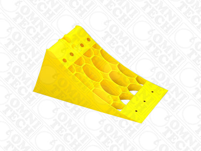 Omni Technosys Terra Chock yellow honeycomb structure HDPE wheel chock for vehicles weighing up to 10 tons side view